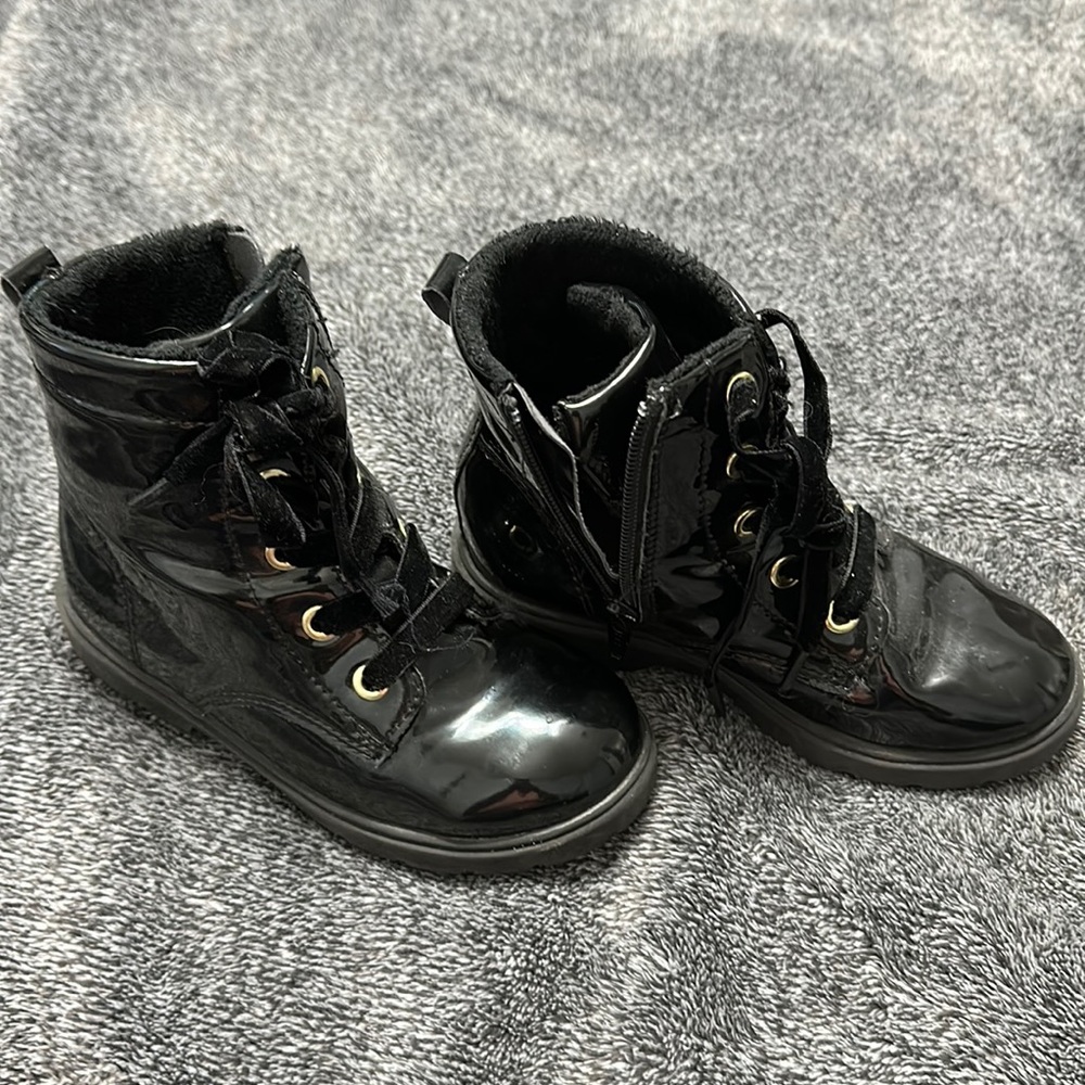 Gently used black zip up boots